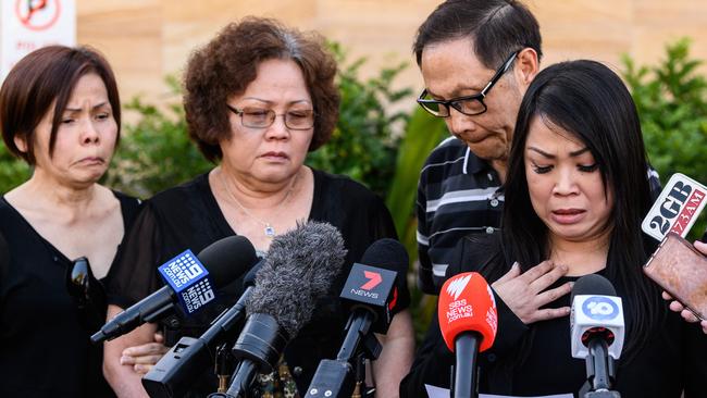 Quanne Diec’s Aunt Wendy Ng (left), Quanne Diec's parents Ann Diec (second left) and Sam Diec (centre) watch on as Quanne Diec's cousin Christine Woo (right) reads a statement. Picture: AAP