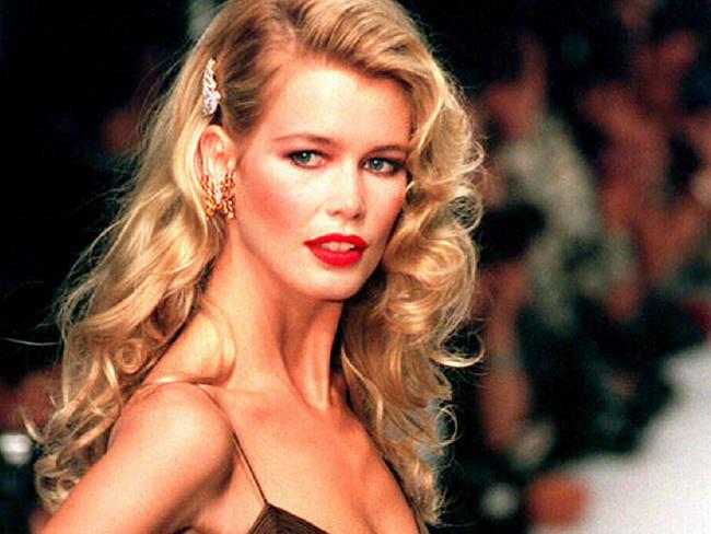 Model Claudia Schiffer displays Valentino evening dress at Carrousel du Louvre 16 October 1994 during Spring / Summer 1995 ready-to-wear fashion collections.                        General