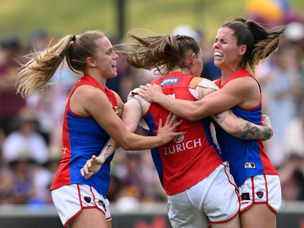 Tayla Harris of the Demons celebrates kicking a goal with team mates during the AFLW Grand Final match between the Brisbane Lions and the Melbourne Demons at Brighton Homes Arena on November 27, 2022 in Brisbane, Australia. (Photo by Matt Roberts/AFL Photos/Getty Images)