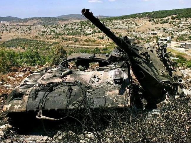 The smouldering remains of a Merkava tank in 2006.