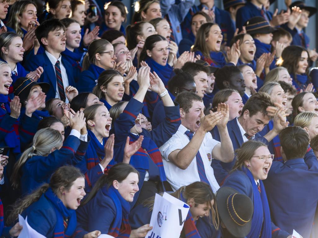 Downlands student supporters cheer their team against Grammar in O'Callaghan Cup on Grammar Downlands Day at Downlands College, Saturday, August 6, 2022. Picture: Kevin Farmer