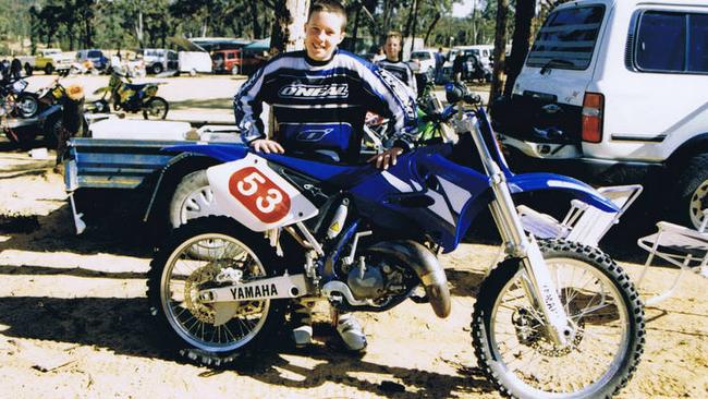 Luke Stojanovic as a teenager with his motocross bike.