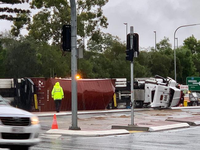 A truck rollover near Bunnings Acacia Ridge on Bradman Street forced the closure of at least one lane about 6.30am. There are reports of a diesel spill following the rollover.Picture: Tommy Payne (Facebook).