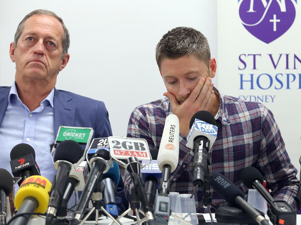 Australian team doctor Peter Brukner, and then-cricket captain Michael Clarke speak at a press conference following Phillip Hughes’ passing.