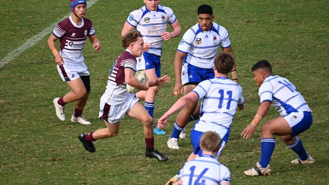 St Mary’s Lachlan Hillman on the move for Queensland White earlier this season.