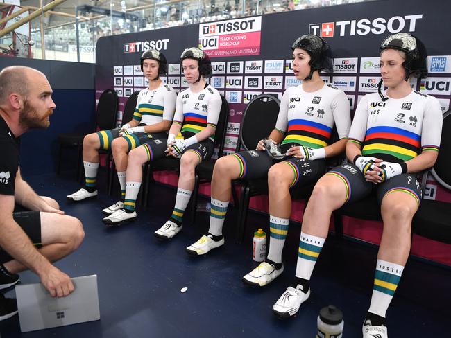 Australian women's team pursuit members Maeve Plouffe, Alexandra Manly, Georgia Baker and Nettie Edmondson listen to their coach Jason Bartram before a qualifying race at the Tissot UCI Track Cycling World Cup in Brisbane in 2019. Picture: Dan Peled/AAP