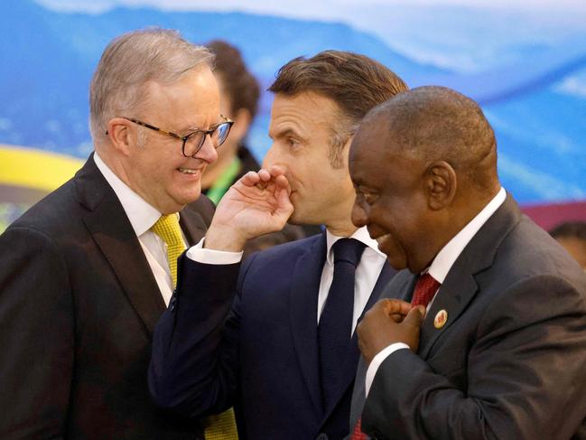 France's President Emmanuel Macron talks to Australia's Prime Minister Anthony Albanese and South Africa's President Cyril Ramaphosa during the first day of the G20 Summit in Rio de Janeiro. Picture: AFP