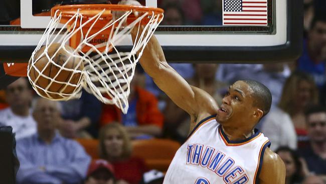 Oklahoma City Thunder's Russell Westbrook dunks against the Miami Heat.