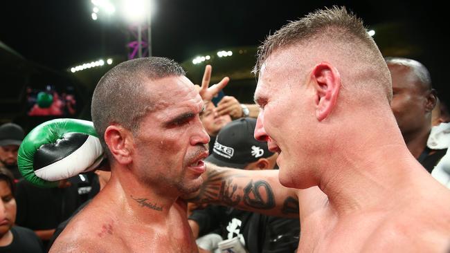 Anthony Mundine and Danny Green embrace after teh final bell. Picture: Getty