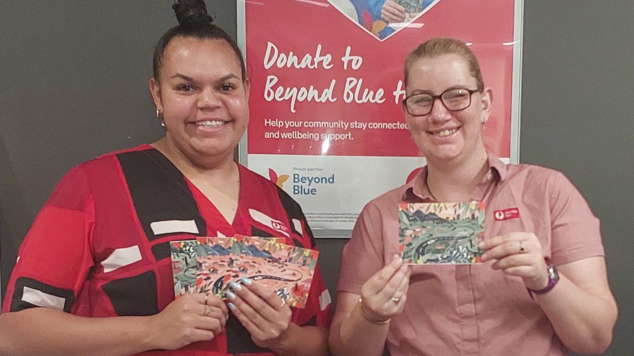 The Roma Post Office team showing their support for the 'Connection Postcards' initiative, which aims to connect rural Australians and combat loneliness. Picture: Supplied.