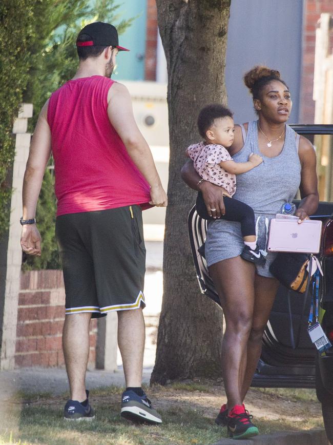Serena Williams and her husband Alexis Ohanian enjoy an afternoon walk with their 1-year-old daughter Alexia Olympia. Serena's daughter looked seriously cute, toddling her way down the footpath, wearing Nike sneakers like her Mummy. Picture: MediaMode