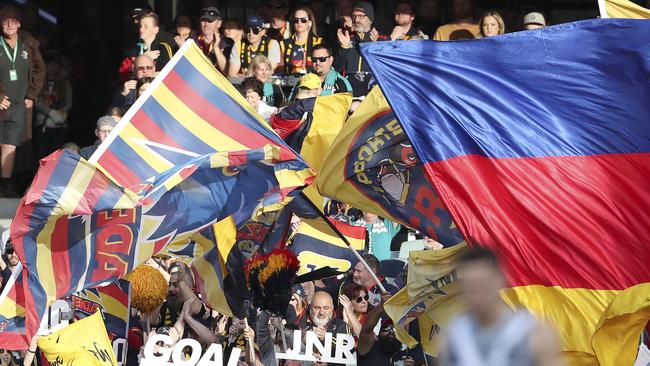 Crows fans celebrate a goal in Showdown 47. Picture: SARAH REED