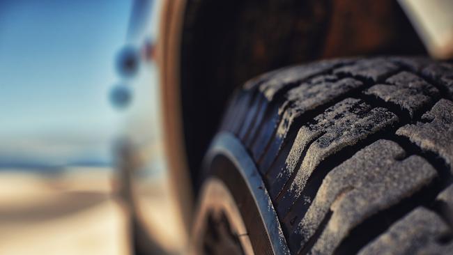 4WD BEACH STOCK -  Shot of a heavy duty 4x4 driving along some sand dunes Picture: Istock