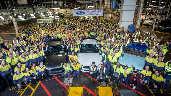 Ford workers send off the last Falcon ute (centre) on the Broadmeadows production line. Picture: Supplied.