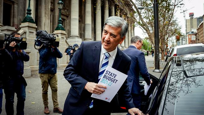 Treasurer Rob Lucas leaves the SA Parliament building with the 2021 budget papers. Picture: Mike Burton