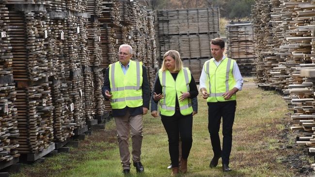 Prime Minister Scott Morrison, Bass MP Bridget Archer and Assistant Minister for Forestry Jonno Duniam at Neville Smith Forest Products, Mowbray, recently. Picture: Alex Treacy