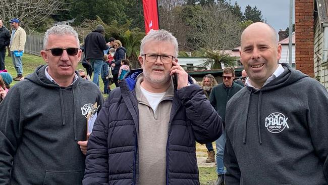 Knight Frank agents Rodney Rawlings, Justin Wiggins and Sam Woolcock at the 'Crack House' sale in August 2021. Picture: Supplied