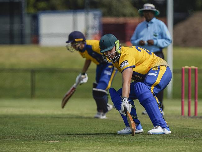 St Brigid's/St Louis batsmen run between wickets. Picture: Valeriu Campan