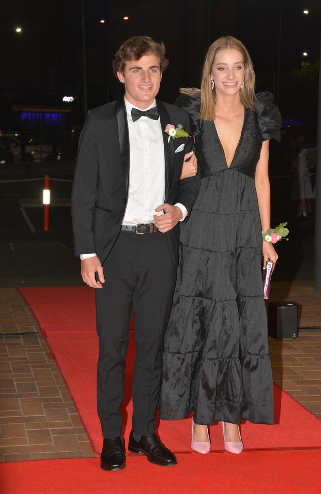 Toowoomba school formals. At the 2023 St Ursula's College formal is graduate Ava Wells with her partner Isaac Burke. Picture: Rhylea Millar