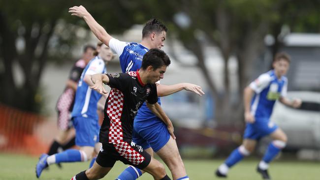 Byron Mcleod of Peninsula Power and Max Sabados of Gold Coast Knights Under-20 during their pre-season cup round played at Dalton Park, Clontraf, Brisbane, Saturday, January 25, 2020. (AAP Image/Regi Varghese)