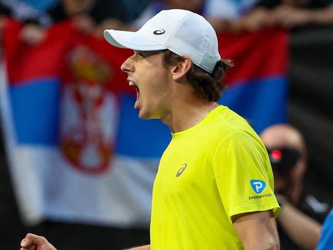 Australia's Alex de Minaur celebrates winning his men's singles match against Serbia's Novak Djokovic at the United Cup tennis tournament in Perth on January 3, 2024. (Photo by COLIN MURTY / AFP) / -- IMAGE RESTRICTED TO EDITORIAL USE - STRICTLY NO COMMERCIAL USE --