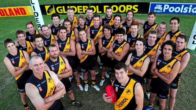 Glenelg’s squad in 2011 with coach Mark Mickan, who was replaced by Kris Massie mid-season.