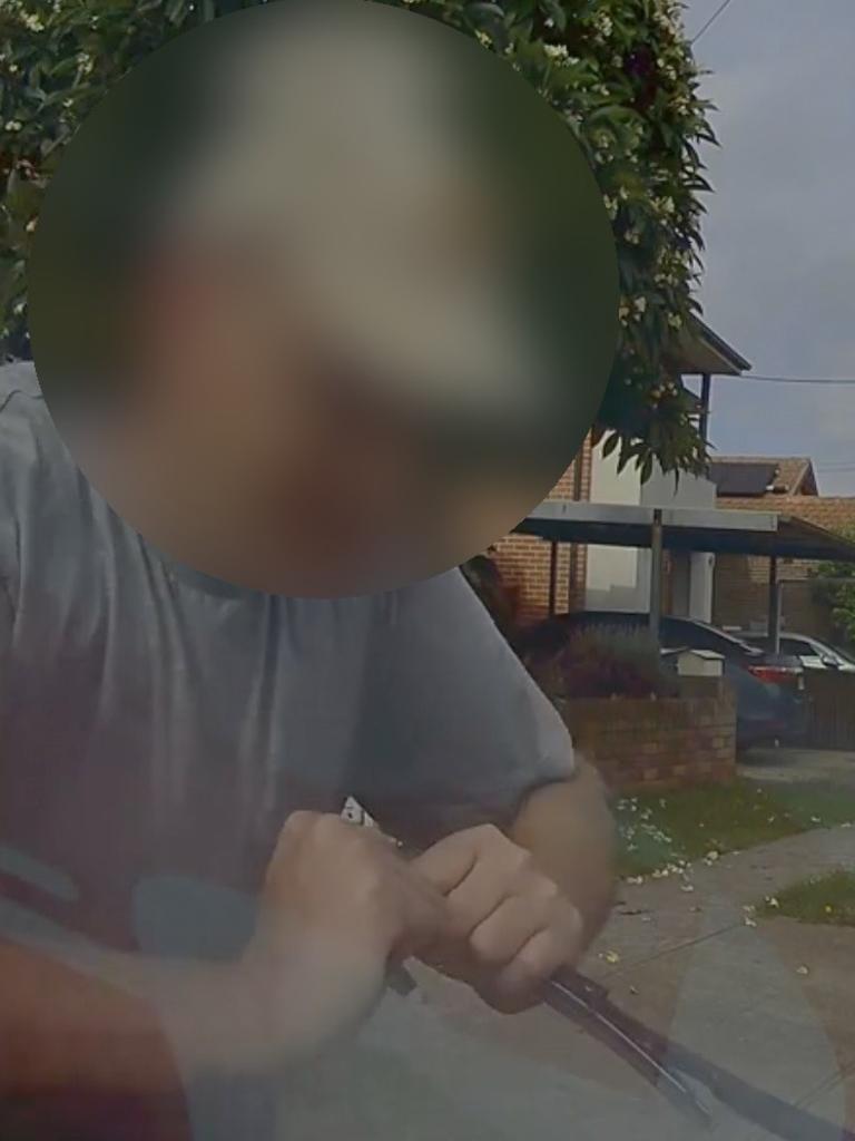 The man bent the wiper back. Picture: Dash Cam Owners Australia