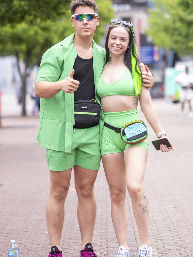 One couple sported matching lime green outfits. Picture: NewsWire / Jeremy Piper