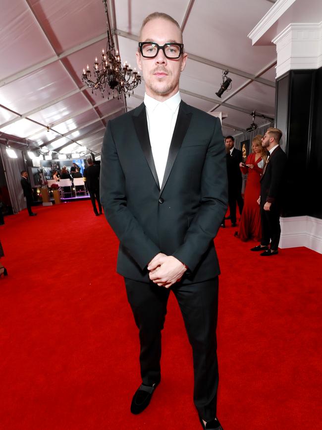 Diplo attends the 61st Annual Grammy Awards in a classy black suit. Picture: Getty