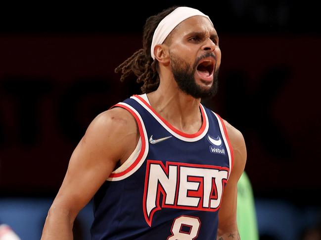 NEW YORK, NEW YORK - DECEMBER 03:  Patty Mills #8 of the Brooklyn Nets celebrates his shot late in the fourth quarter against the Minnesota Timberwolves at Barclays Center on December 03, 2021 in the Brooklyn borough of New York City. The Brooklyn Nets defeated the Minnesota Timberwolves 110-105. NOTE TO USER: User expressly acknowledges and agrees that, by downloading and or using this photograph, User is consenting to the terms and conditions of the Getty Images License Agreement. (Photo by Elsa/Getty Images)