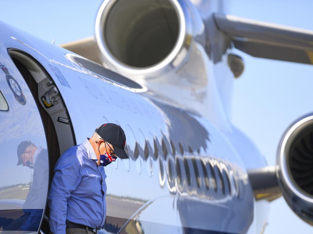 Prime Minister Scott Morrison touches down at Longreach Airport yesterday. Picture: Lukas Coch/AAP/NCA NewsWire