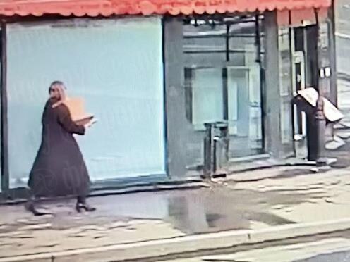 Eerie footage shows Darya Tripova carrying a box to the cafe. Picture: East2west News