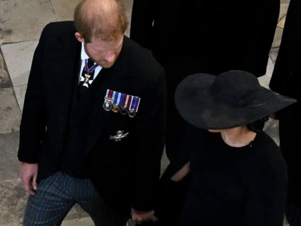 Meghan and Harry were spotted holding hands as they left the abbey. Picture: Gareth Cattermole/Getty Images