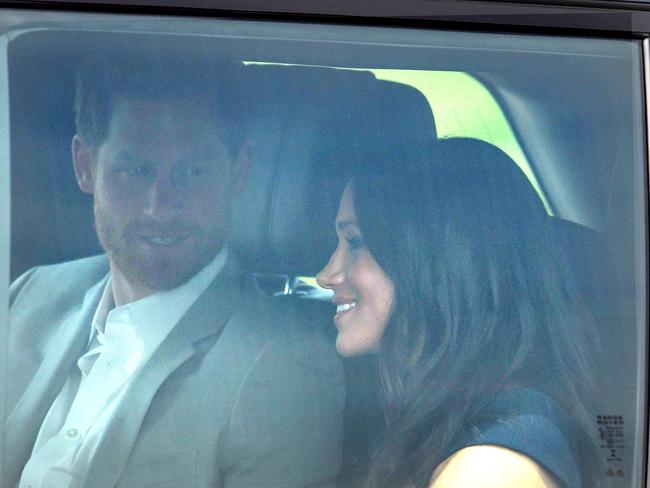 Prince Harry and Meghan Markle arrive at Windsor Castle on the day before their wedding as security goes into full force. Picture: James Whatling / MEGA