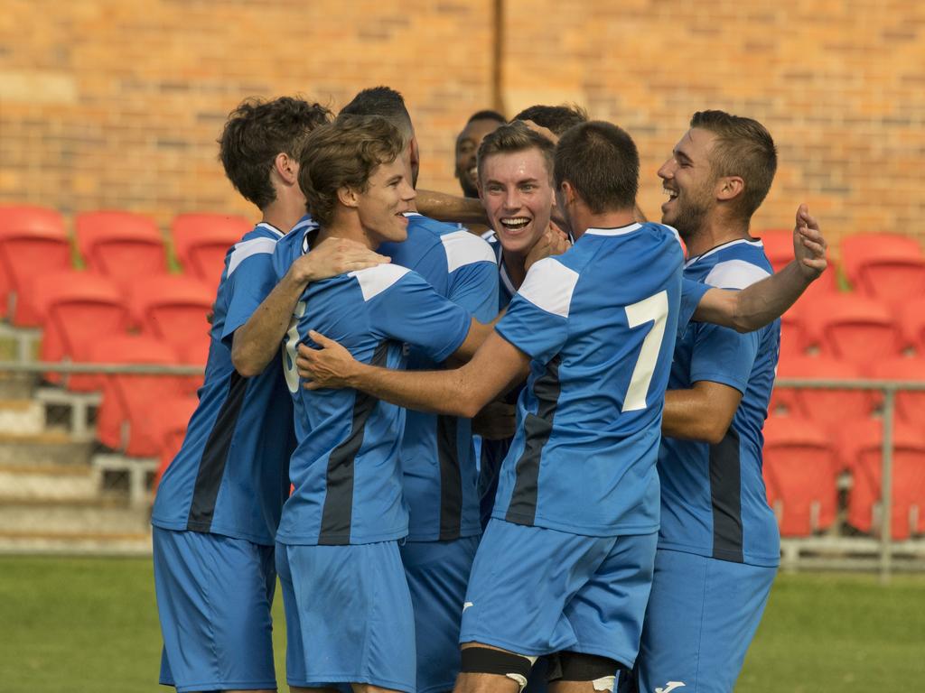 Thunder players celebrate their first goal of the match. Football Qld NPL, SW Qld Thunder vs Holland Park Hawks FC. Sunday, 1st Mar, 2020.