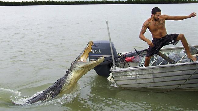 MARCH 3, 2008. DARWIN, NT. Israeli traveller Novon Mashiah, who was posing for a photograph on a dinghy when a 4 metre salt water crocodile leapt out of the water to try and attack him, caught on camera by his friend Doron Aviguy, who was fishing from a nearby boat. (Photo by News Ltd / Newspix) (Photo by News Ltd / Newspix)Contact Email: newspix@newsltd.com.auContact Web URL: www.newspix.com.auContact Email: newspix@newsltd.com.au