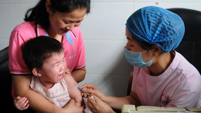 A child is vaccinated in China's central Jiangxi province last July. Picture: AFP