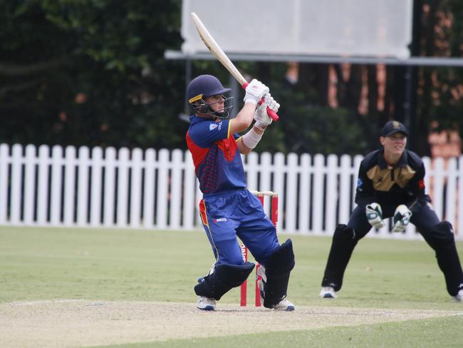 Noah Quayle sends the ball deep. Photographer: Warren Gannon Photography