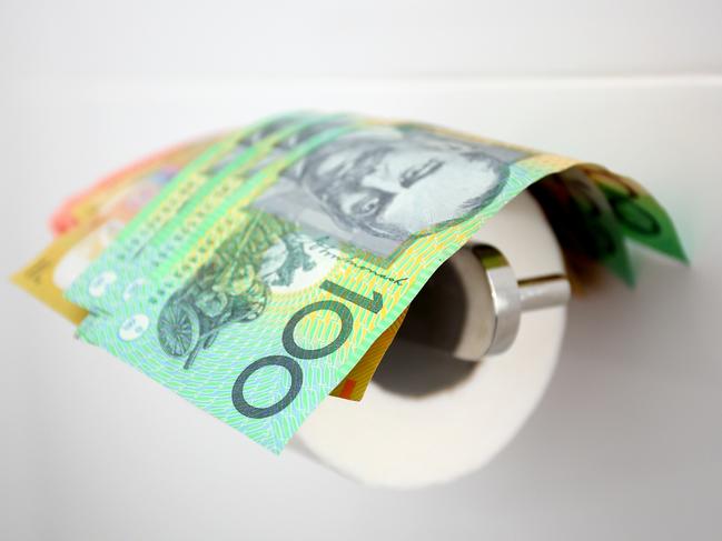 Flushing money down the toilet. Australian money in toilet, generic