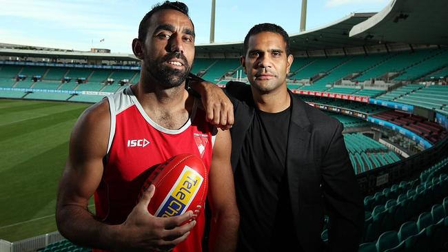  Adam Goodes (L) and former teammate Michael O'Loughlin at Sydney Swans AFL team training session at the SCG in Sydney. Goode...