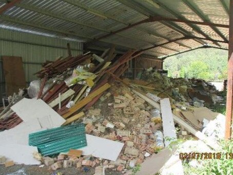 Rubbish piled high at 1060 Yarramalong Rd, Wyong Creek.