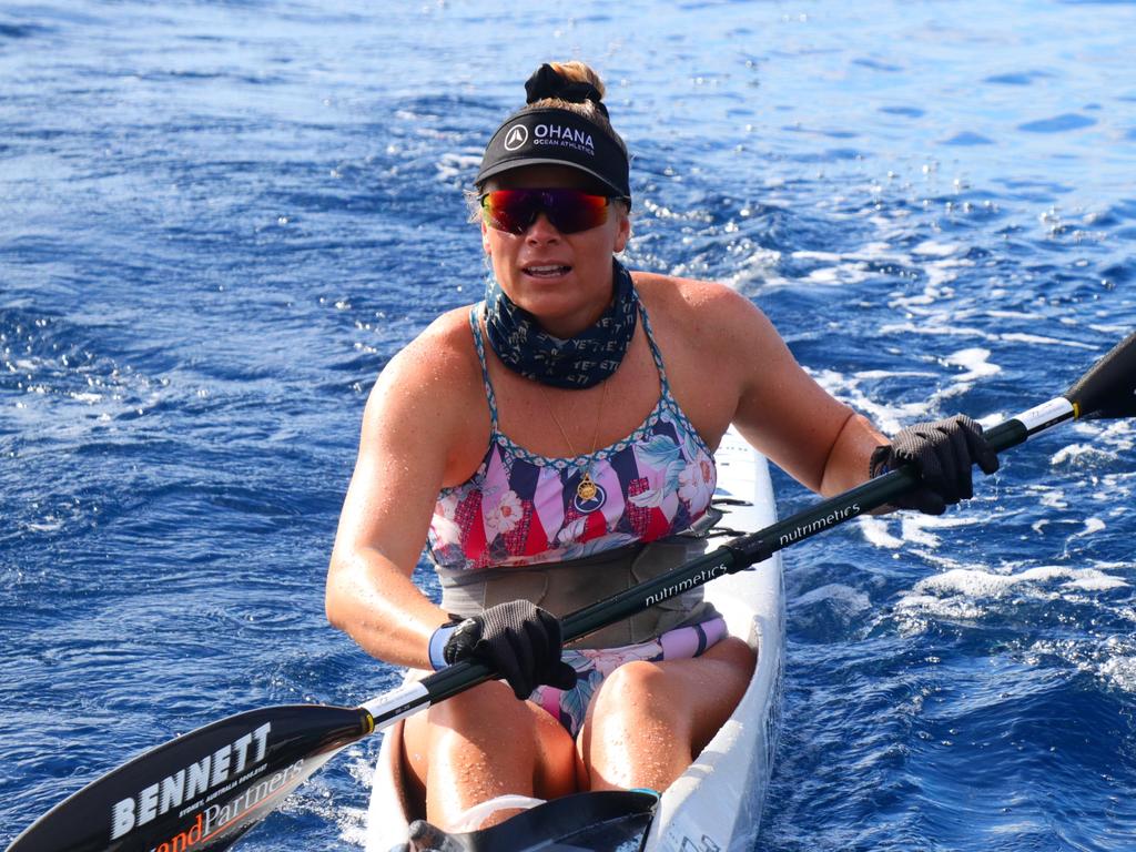 Sharks, surf and stars … Bonnie Hancock became the fastest and youngest person to paddle around Australia. Photo: Supplied