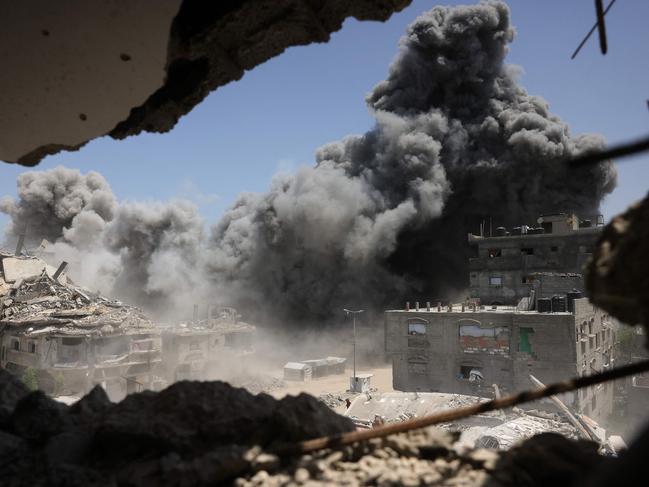 Smoke and debris rise following an Israeli strike on a house west of Jabalia, in the northern Gaza Strip. Picture: AFP