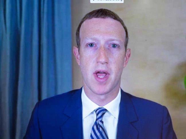 Mark Zuckerberg’s Facebook took a less aggressive stance in limiting the posting of a negative New York Post article on Joe Biden. Picture: AFP