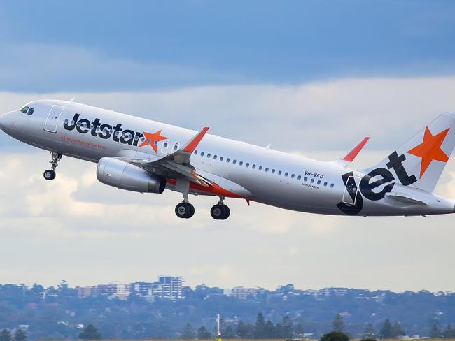 SYDNEY, AUSTRALIA - NewsWire Photos JUNE 14, 2021: A view of a Jetstar plane taking off at Sydney Domestic Airport from Port Botany in Sydney Australia. Picture: NCA NewsWire / Gaye Gerard