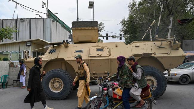 Taliban fighters patrol along a street in Kabul. Picture: AFP