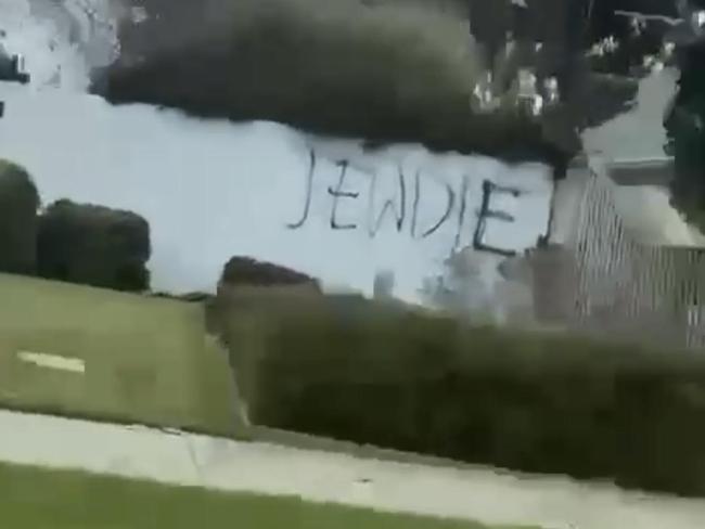 Anti-Semitic graffiti on the front fence of the Mount Scopus Burwood Campus. Picture: Supplied.