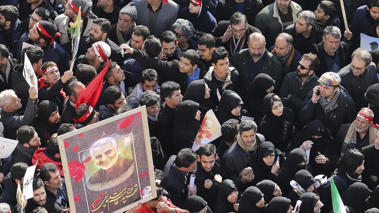 Mourners attend a funeral ceremony for Iranian Gen. Qassem Soleimani and his comrades who were killed in Iraq in a US drone strike on Friday at the Enqelab-e-Eslami (Islamic Revolution) square in Tehran, Iran. Picture: AP/Ebrahim Noroozi