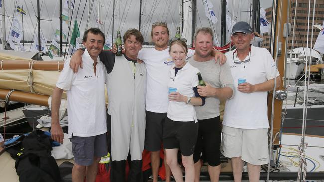 Sean Langman and Peter Langman, second and third form left, have sailed many races together.