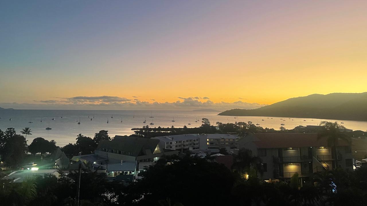 Views of Airlie Beach at sunrise from our Water’s Edge Resort apartment. Picture: Kara Jung